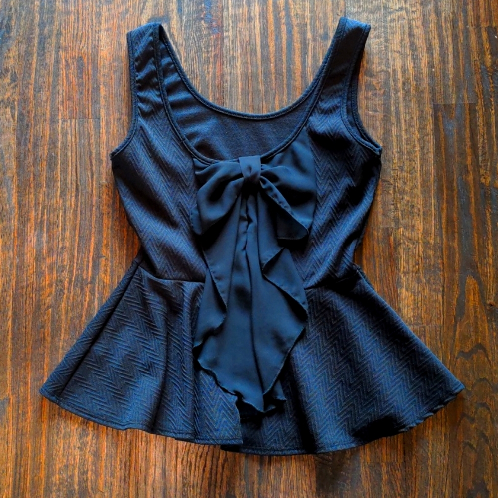 Black textured peplum tank
